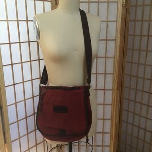 Duluth Trading Co. oil cloth sling bag in red